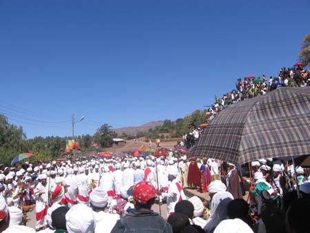 Timket Festival Decons and locals fist