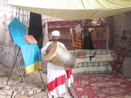 Aprist beating a  Drum